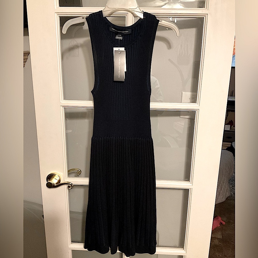 THE FRENCH COLLECTION Size 8. NWT Black and blue colors. Snug fitting.